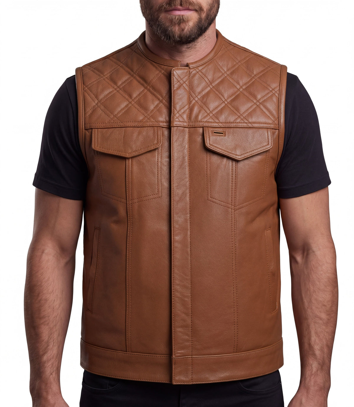 Man wearing a cognac brown leather motorcycle club vest with diamond-quilted shoulders and flap chest pockets.
