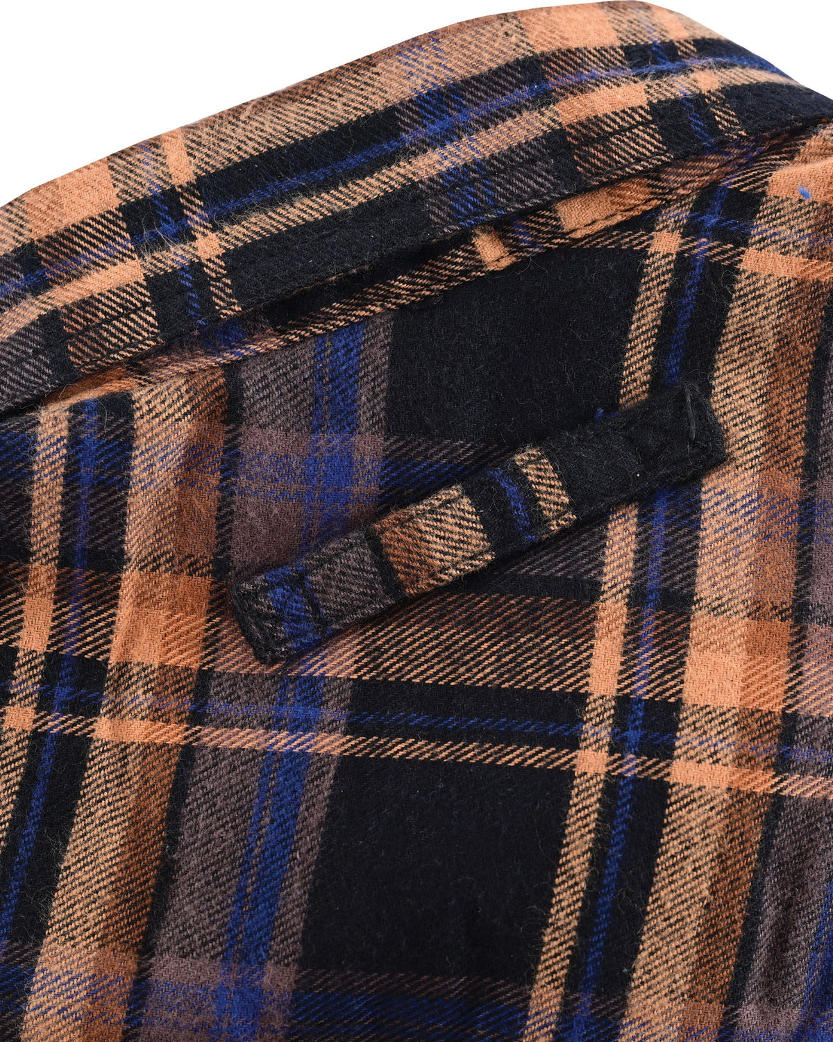 Close-up of the plaid hanging loop beneath the back collar of the Midnight Rust flannel shirt.