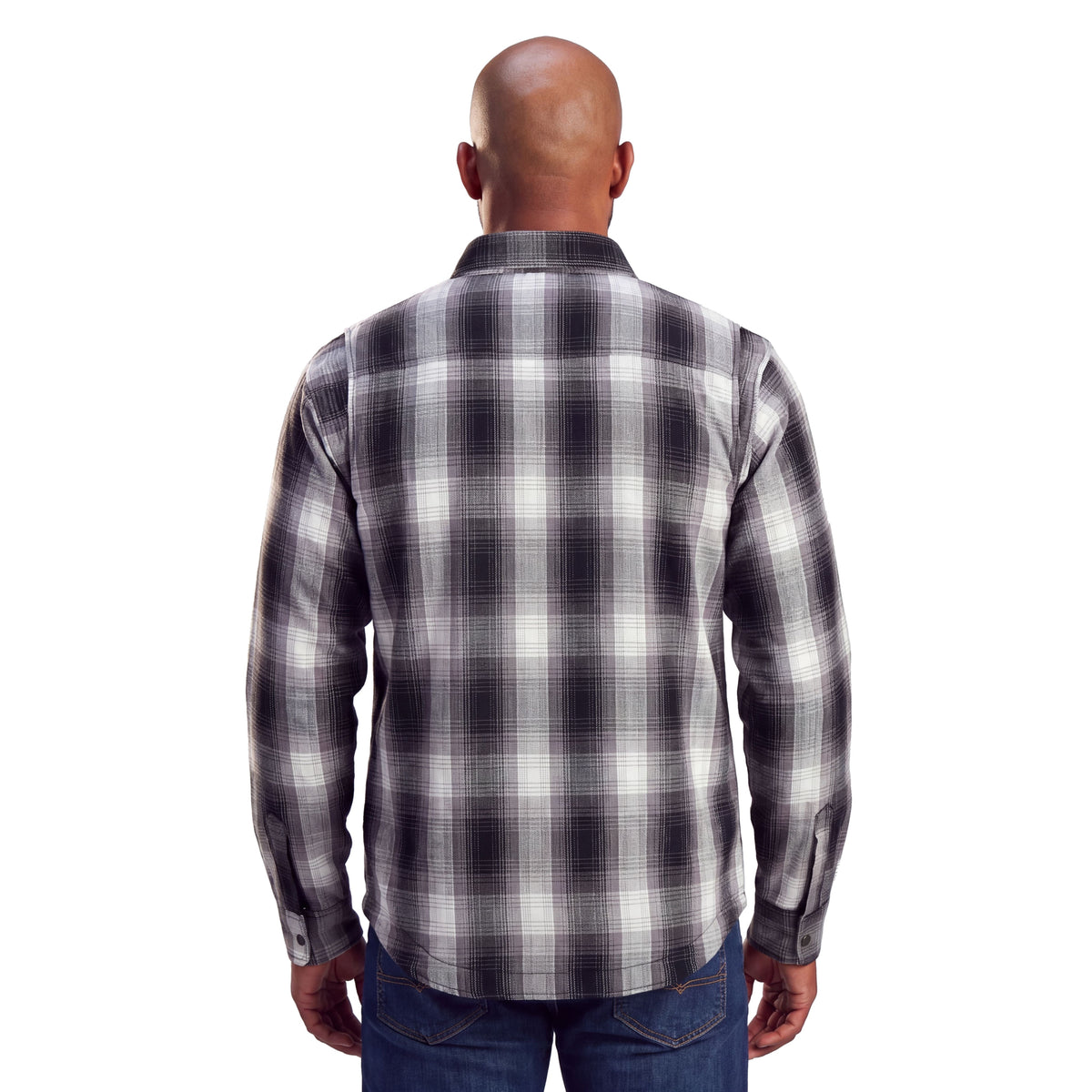 Rear view of a model wearing the men’s Timberwolf armored flannel motorcycle shirt in charcoal plaid with long sleeves.