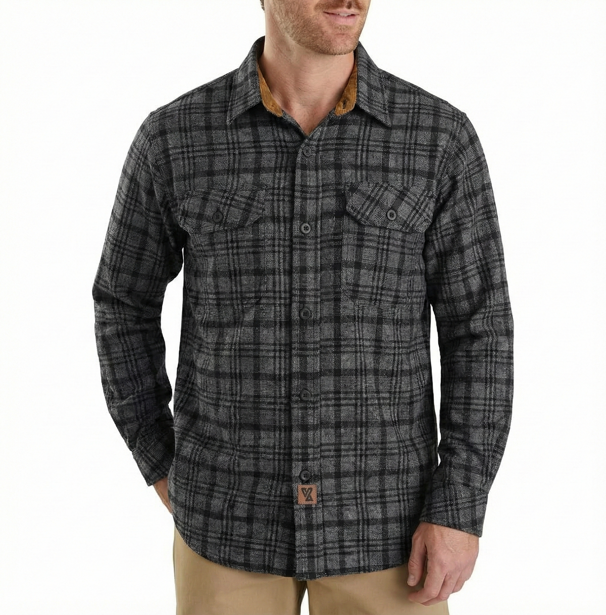 Model wearing men's Dark Truffle plaid flannel shirt with long sleeves, button front and two chest pockets.