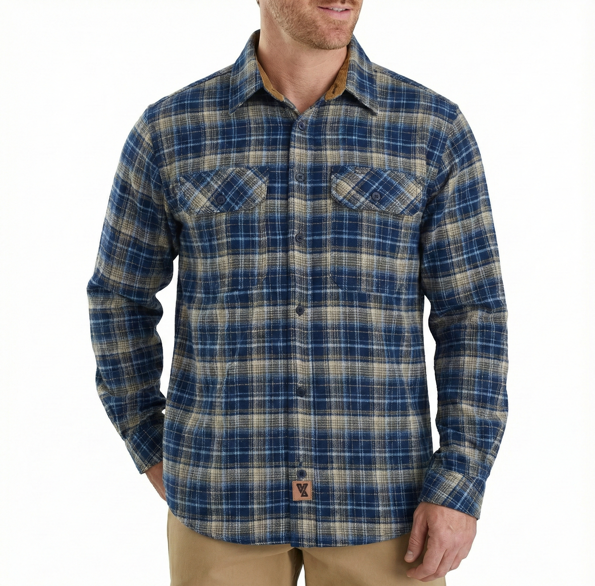 Model wearing the men's Keen Midnight navy and tan plaid flannel shirt with long sleeves and two chest pockets.