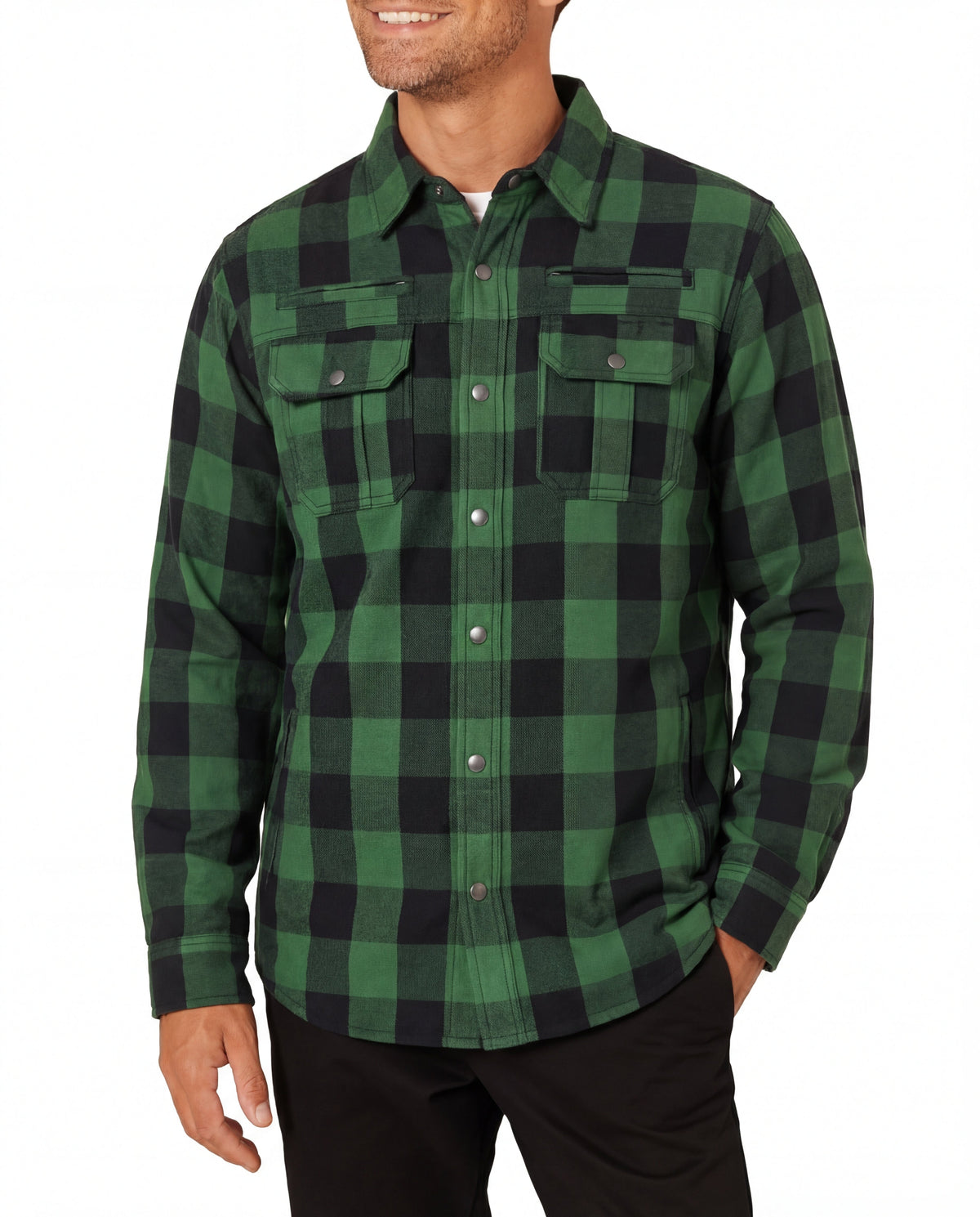 Model wearing a green and black plaid armored motorcycle shirt showing the front fit and chest pockets.