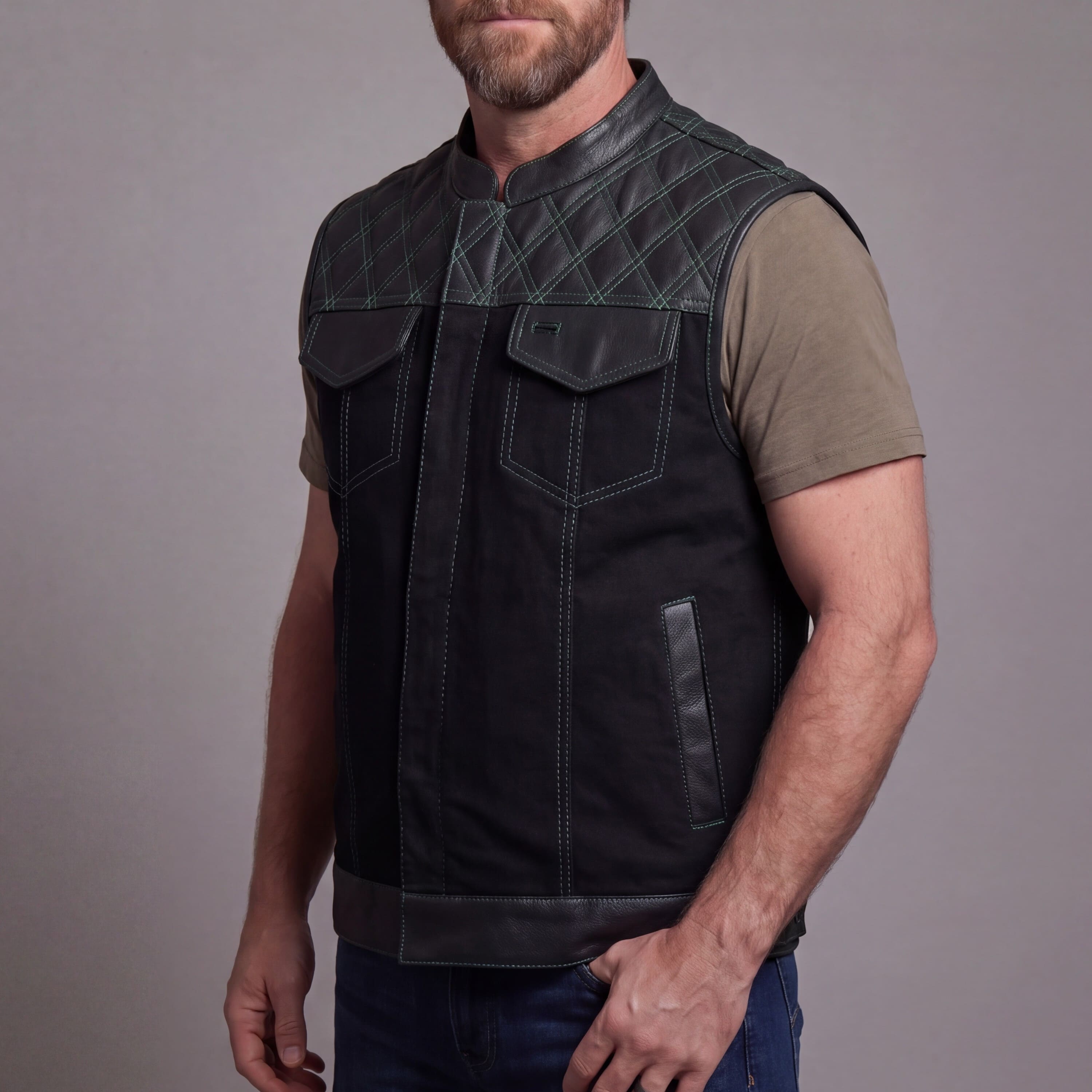 Men's Denim & Leather Motorcycle Vest with Conceal Carry Pockets and Green Stitching - Side Pose