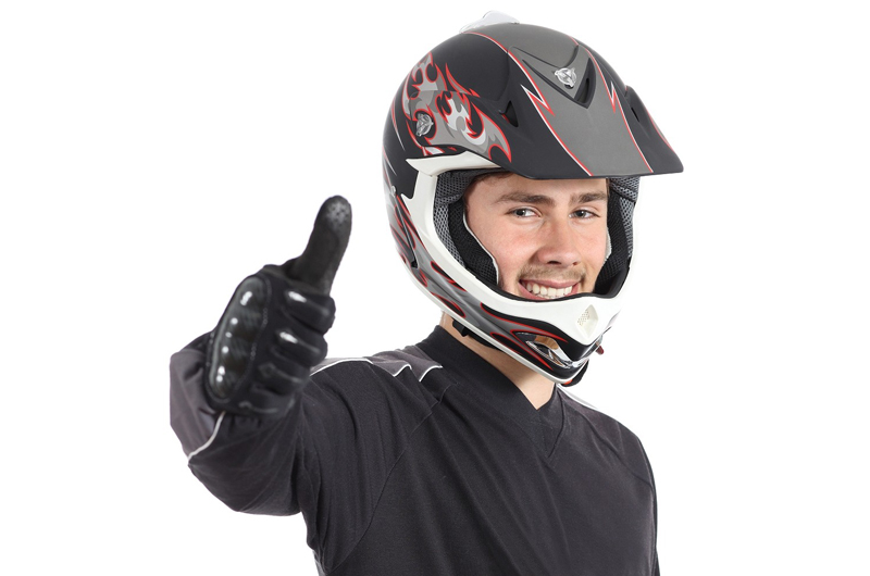 A man wearing an off-road helmet